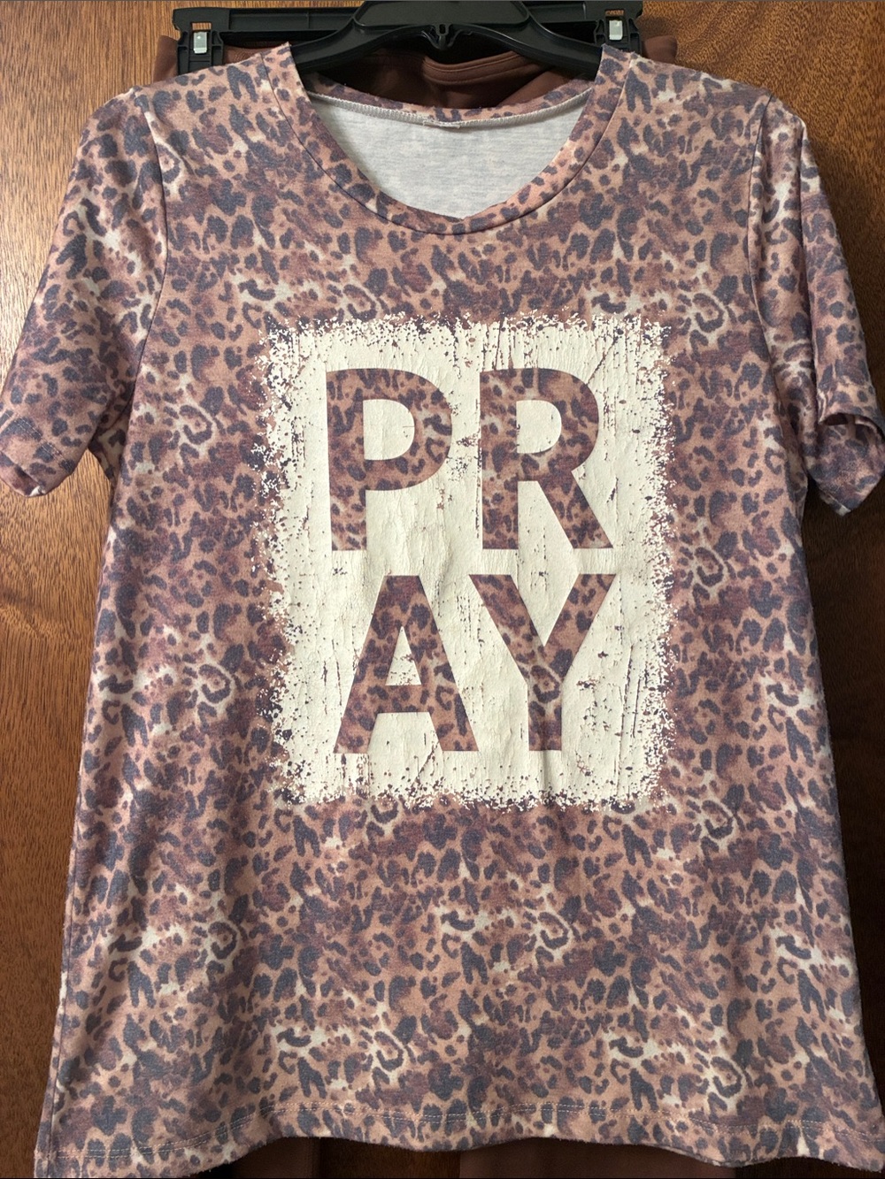 Women size medium brown leopard print T shirt